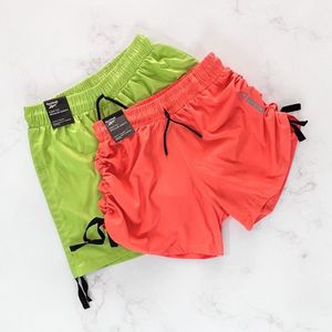 شورتک ورزشی بغل گتر دار پارچه آیرو ریباک Reebok