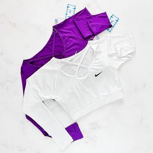 فروش اینترنتی کراپ تاپ ورزشی آستین دار فینگر دار نایکی Nike