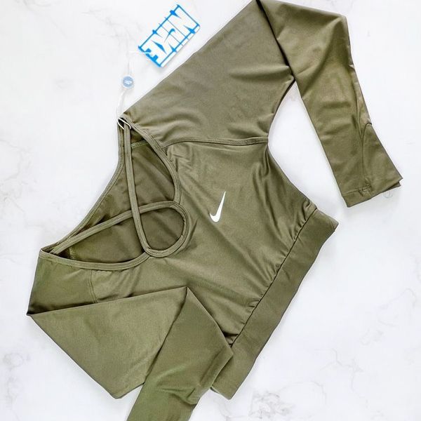 کراپ تاپ ورزشی آستین دار فینگر دار نایکی Nike