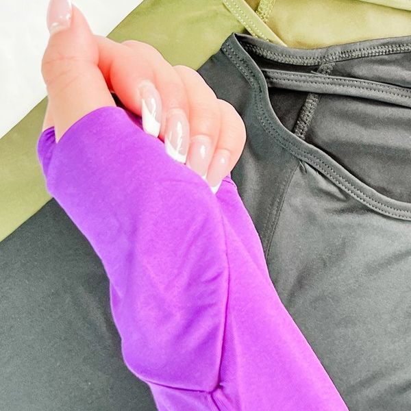 کراپ تاپ ورزشی آستین دار فینگر دار نایکی Nike