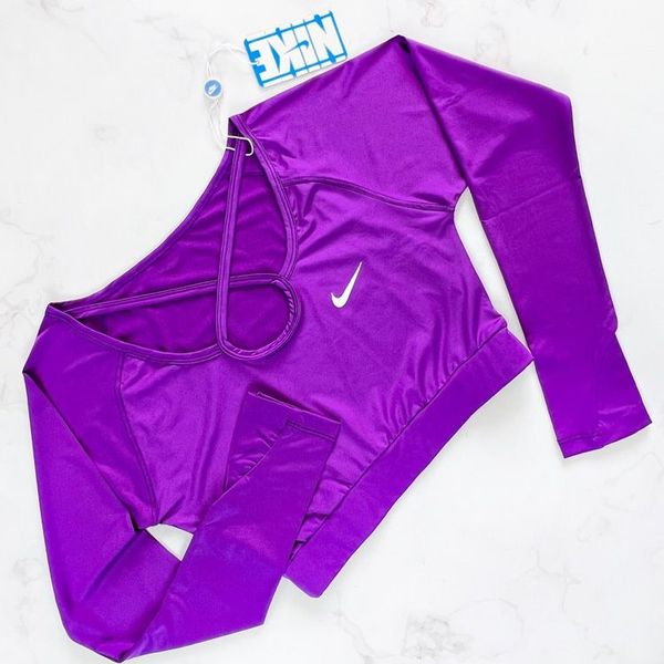 کراپ تاپ ورزشی آستین دار فینگر دار نایکی Nike