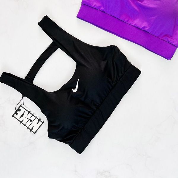 نیمتنه کاپدار ورزشی پشت ضربدری نایکی Nike