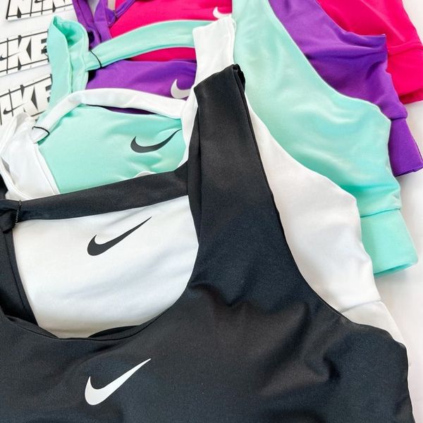 نیمتنه کاپدار ورزشی پشت ضربدری نایکی Nike