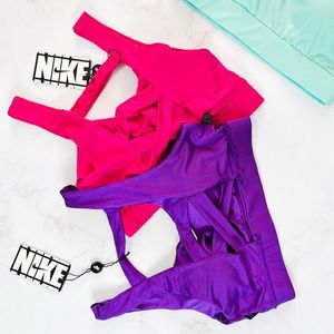 خرید آنلاین نیمتنه کاپدار ورزشی پشت ضربدری نایکی Nike