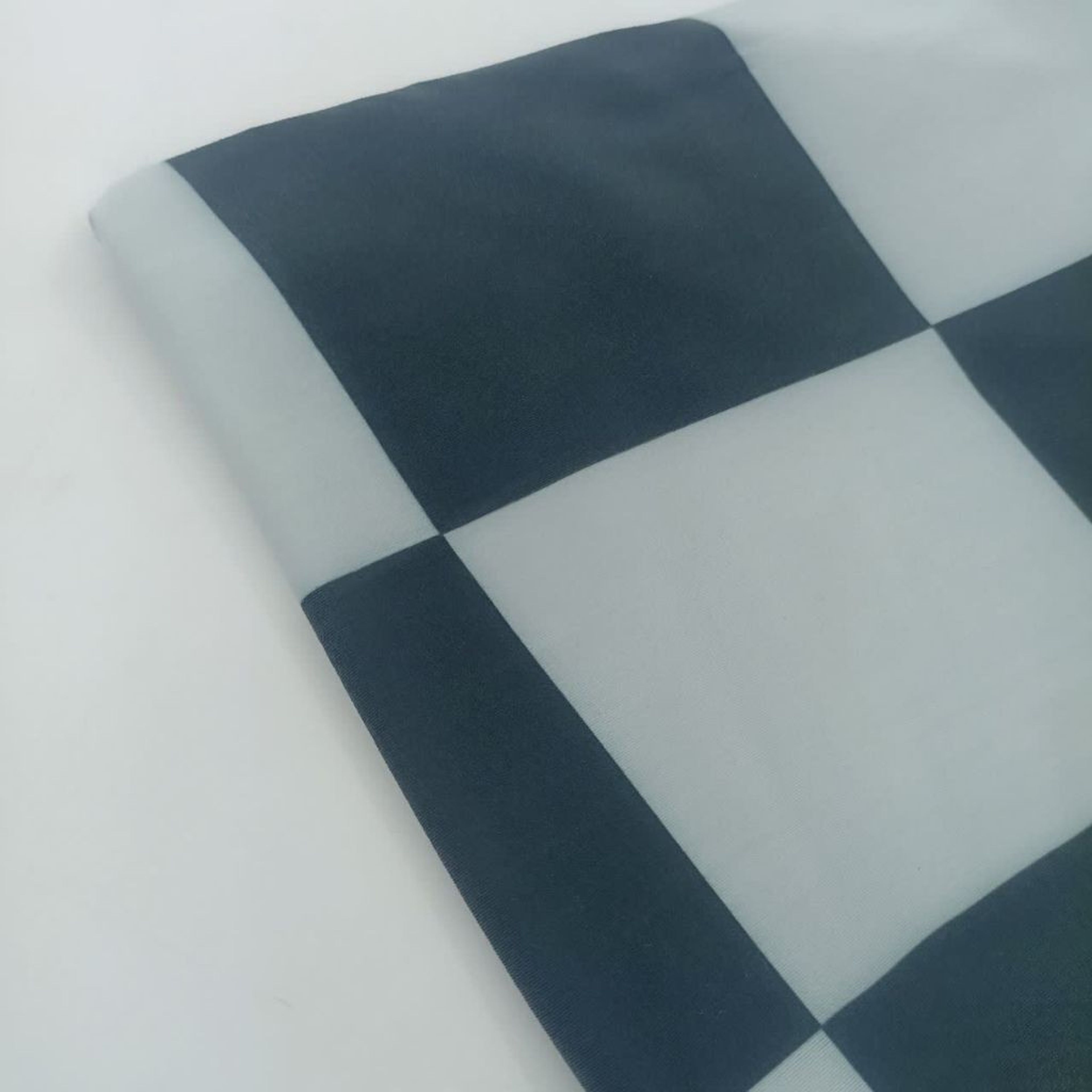 خرید اینترنتی پارچه تریکو شطرنجی کم رنگ