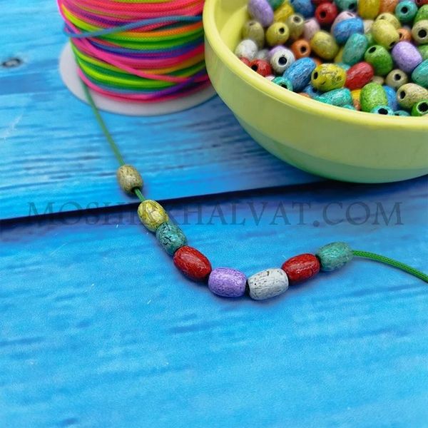 مهره پلاستیکی گندمی بسته 100 عددی