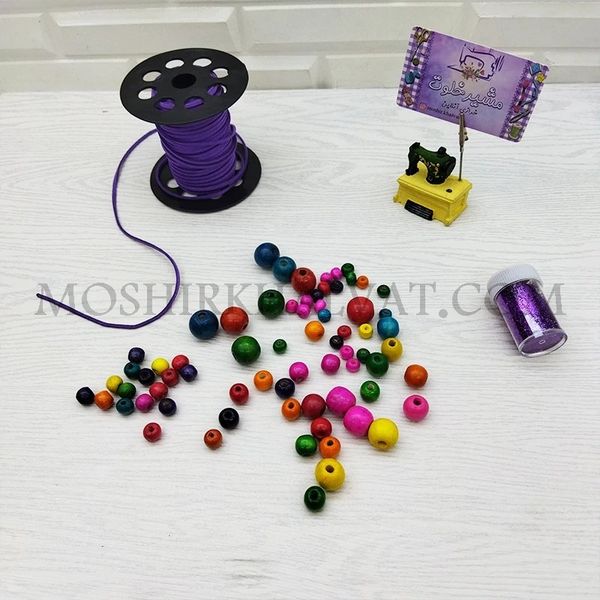 مهره چوبی رنگی گرد