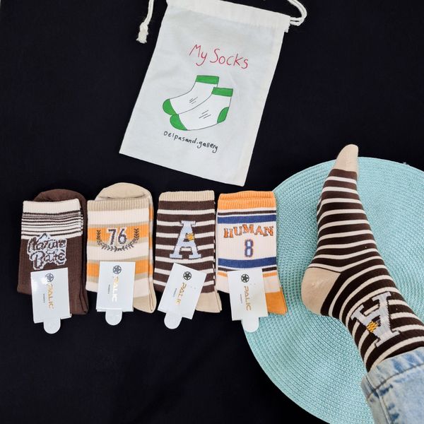 جوراب ساقدار زنانه طرح کرم قهوه ای