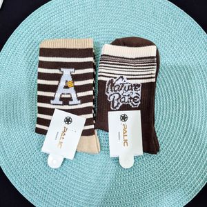 مشخصات جوراب ساقدار زنانه طرح کرم قهوه ای