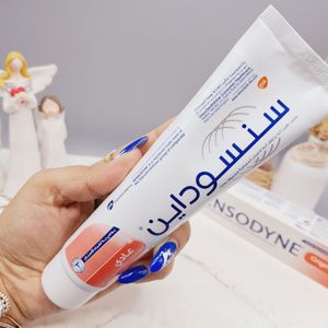 خرید آنلاین خمیر دندان سفید کننده سنسوداین ‏sensodyne با مراقب