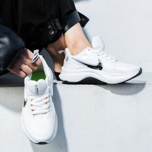 خرید آنلاین کفش ورزشی زنانه Nike مدل Taban