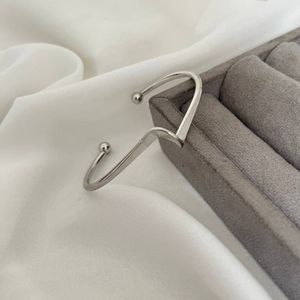 خرید آنلاین بنگل النگویی استیل آبکاری نقره ای و طلایی