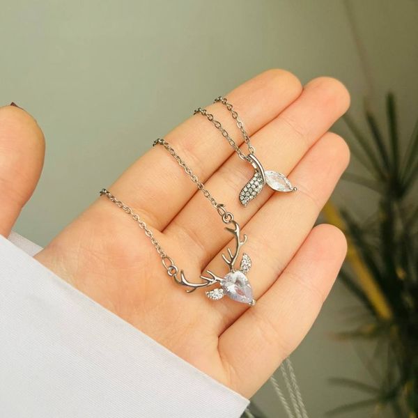 گردنبد استیل طرح گوزن و دم وال