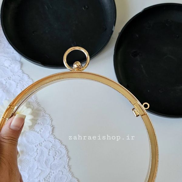 کیف کلاچ مدل دایره دسته دار طلایی