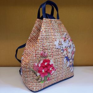 خرید آنلاین کوله پشتی مدل مثلثی طرح گل