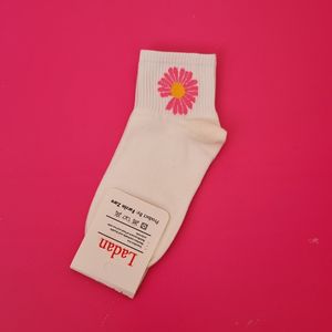 خرید انلاین جوراب زنانه نیم ساق کبریتی طرح بابونه