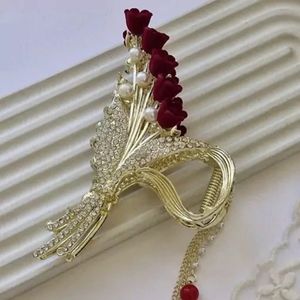 فروش اینترنتی کلیپس فلزی مجلسی گل شکوفه قرمز