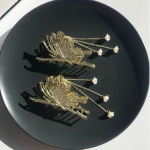 خرید اینترنتی کلیپس مجلسی فلزی پروانه آویزدار