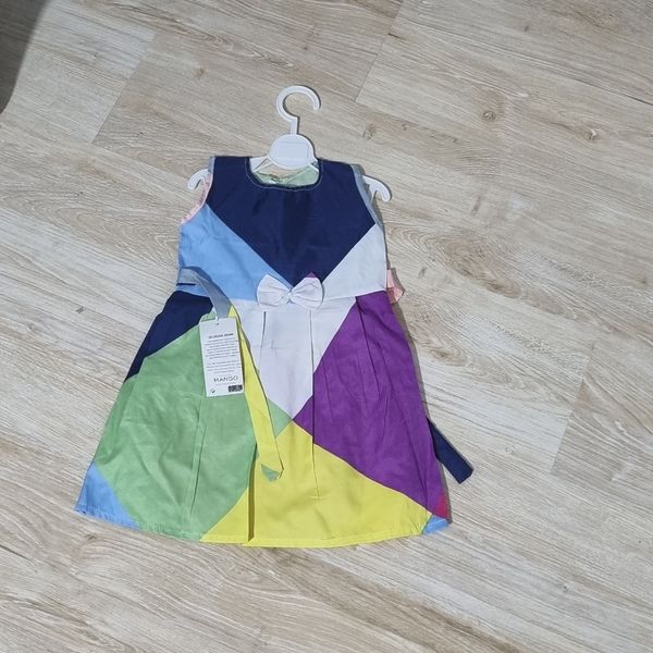 پیراهن دخترانه پارچه ای رنگارنگ مناسب برای استایل شاد و کودکانه