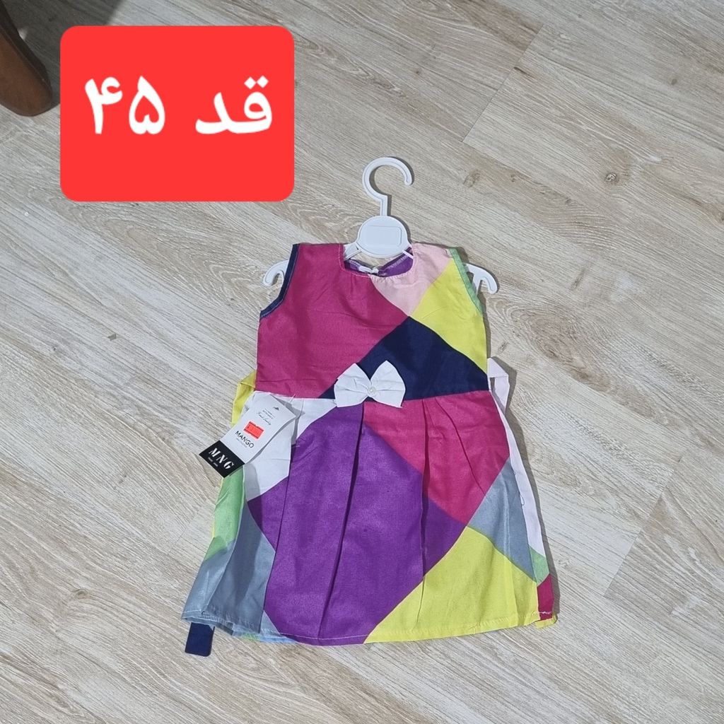 قیمت پیراهن دخترانه پارچه ای رنگارنگ مناسب برای استایل شاد و کودکانه