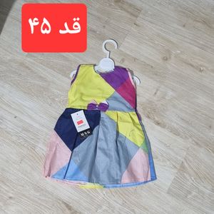 فروش اینترنتی پیراهن دخترانه پارچه ای رنگارنگ مناسب برای استایل شاد و کودکانه