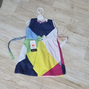 خرید انلاین پیراهن دخترانه پارچه ای رنگارنگ مناسب برای استایل شاد و کودکانه