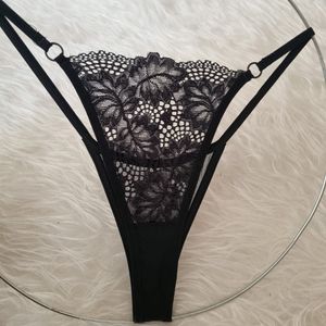 فروش اینترنتی شورت لامبادا زنانه مشکی فانتزی فری تا سایز 46 گیپور زیر نخ