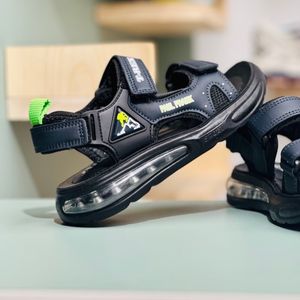 خرید اینترنتی قیمت صندل بچگانه اسپرت طرح کپسولی T-rex برند Kids کد 4012401