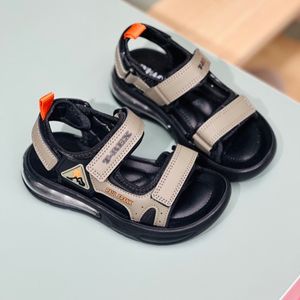 خرید اینترنتی قیمت صندل بچگانه اسپرت طرح کپسولی T-rex برند Kids کد 4012401