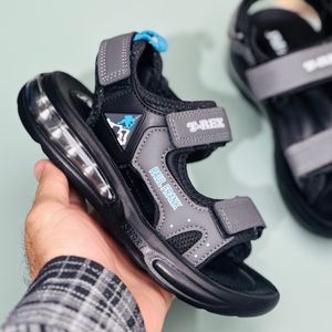 خرید اینترنتی قیمت صندل بچگانه اسپرت طرح کپسولی T-rex برند Kids کد 4012401