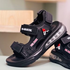 خرید اینترنتی قیمت صندل بچگانه اسپرت طرح کپسولی T-rex برند Kids کد 4012401