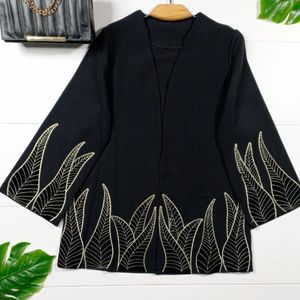 مشخصات مانتو زنانه طرح برگی