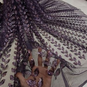مشخصات پارچه توری مجلسی ملیله متریال پرکار طرح برگی 1