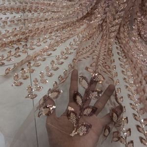 قیمت ارزان پارچه توری مجلسی ملیله متریال پرکار طرح برگی 2