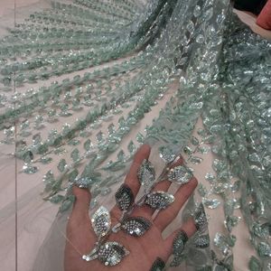 فروش اینترنتی پارچه توری مجلسی ملیله متریال پرکار طرح برگی 3