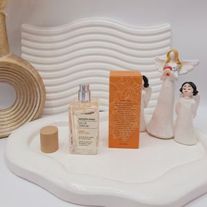 خرید اینترنتی عطر بیکینی رایحه مشابه نارنگی (DAWN LOVE SONG) حجم 50 میل فوق العاده خوشبو