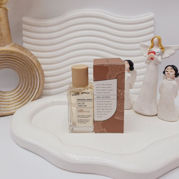 عطر بیکینی رایحه چوب صندل (SNDALWOOD) حجم 50 میل فوق العاده خوشبو با ماندگ
