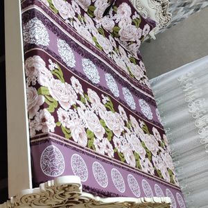 خرید اینترنتی ملحفه کشدار دونفره با دوعدد روبالش طرح سفید بنفش گلدار