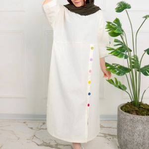 خرید اینترنتی کفتان بلند دکمه رنگی زنانه
