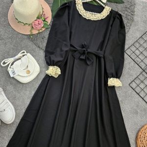 خرید آنلاین مانتو زنانه طرح مهپوش
