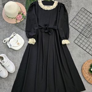 خرید انلاین مانتو زنانه طرح مهپوش