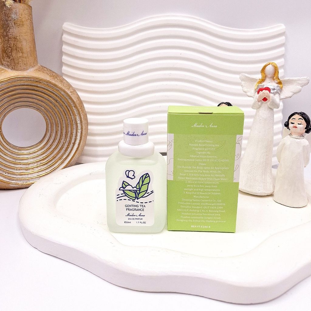 فروش اینترنتی عطر بیکینی رایحه برگ درخت چای سبز حجم 50 میل برند میدن آنا