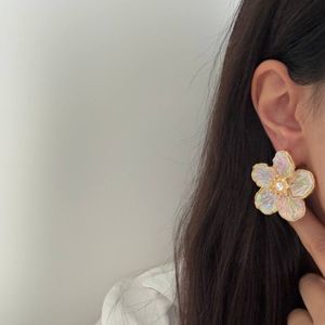 قیمت ارزان گوشواره گل یونیکورن هانا