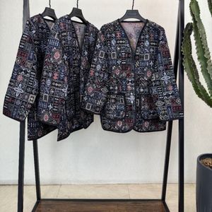 خرید آنلاین کت زنانه طرح خورشید