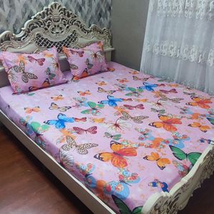خرید اینترنتی ملحفه  روتختی دونفره  تمام کش و رو بالش لبه دوزی زیپدار طرح پروانه صورتی دونفره 