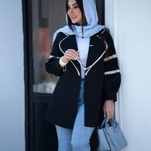 خرید اینترنتی مانتو لینن عروسکی مدل وشان 2