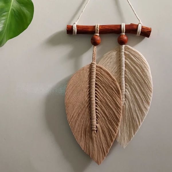 دیوارکوب‌برگ مکرومه بافی طرح دل گره