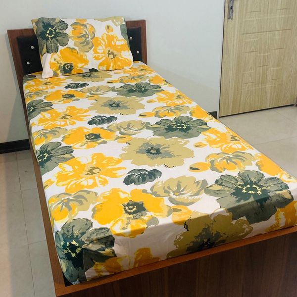 ملحفه کشدار پارچه تنسل مدل آفتابگردان یکنفره 2تکه عرض 90