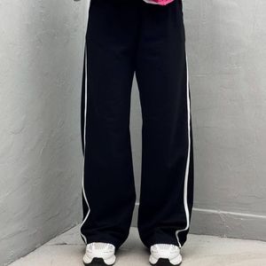 خرید انلاین شلوار بگ بغل نوار