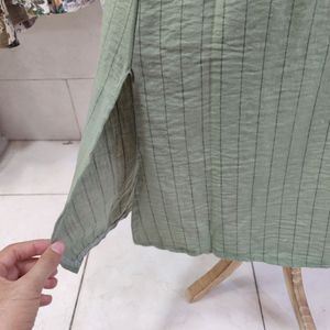خرید اینترنتی مانتو‌ زنانه بلند مدل الناز با کمربند چرم
